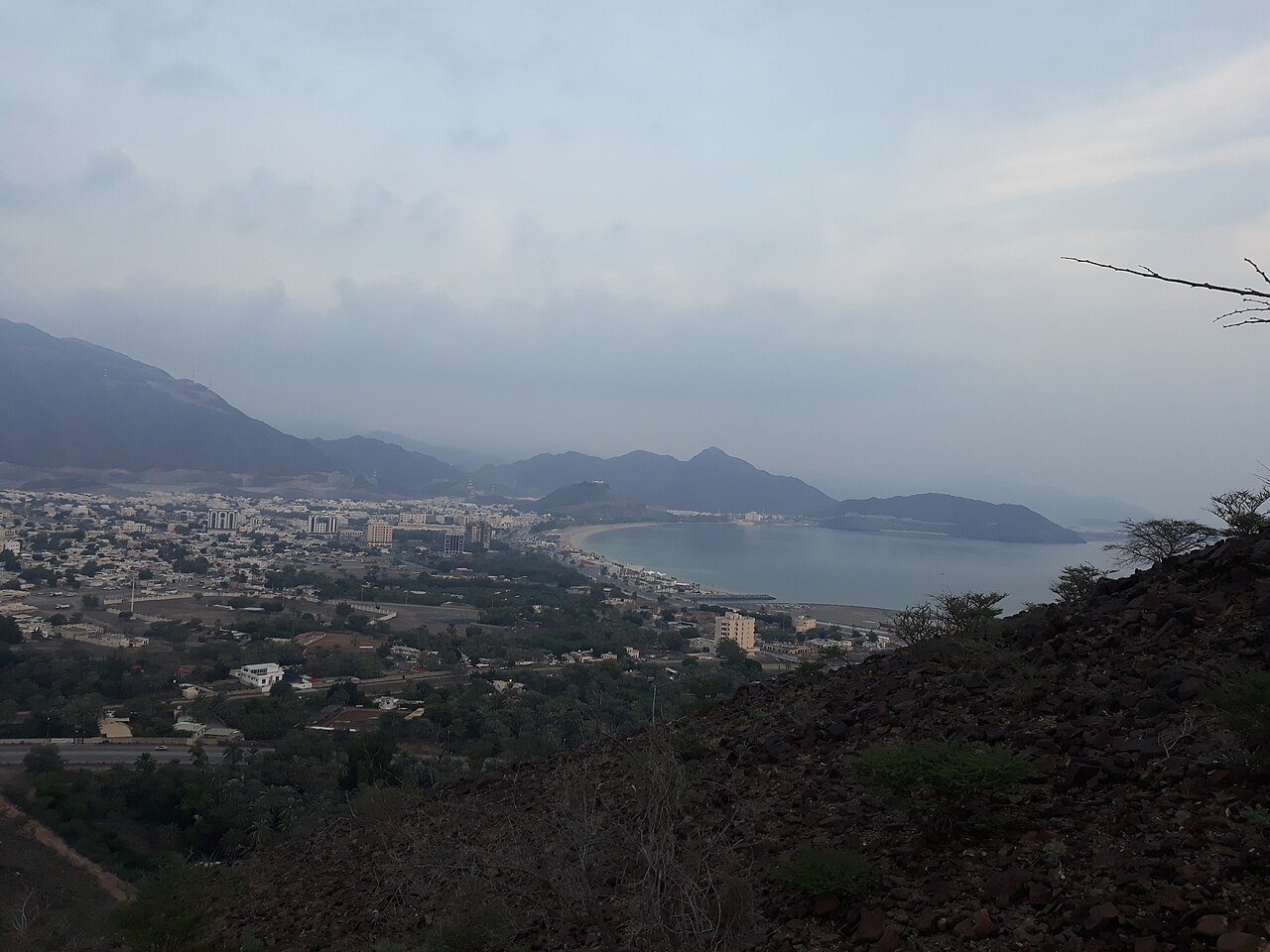 Khorfakkan town and bay from the Al Rabi mountain trail; not a beach-level view